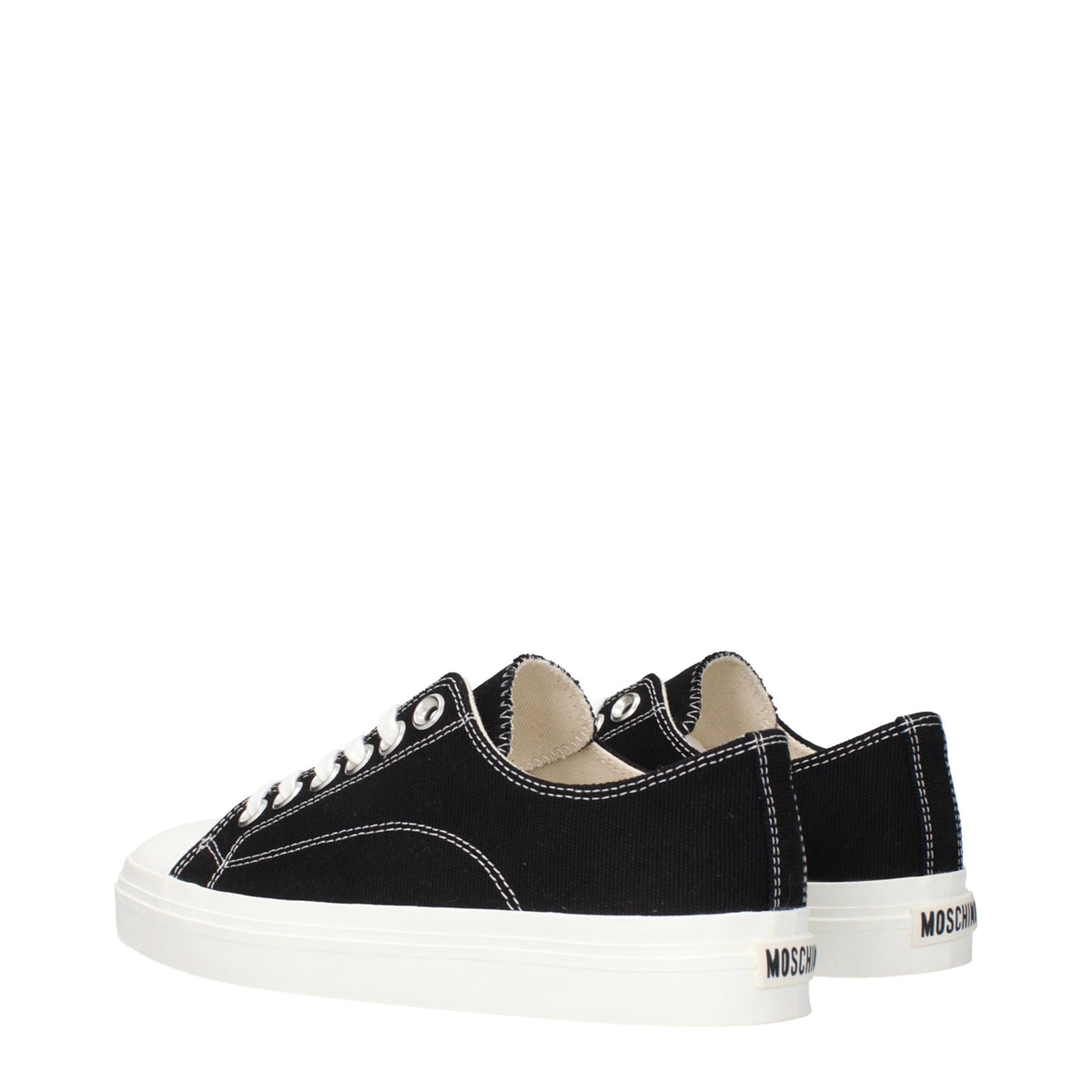Black fabric low top sneakers by Moschino with white sole and stylish design, perfect for casual wear.