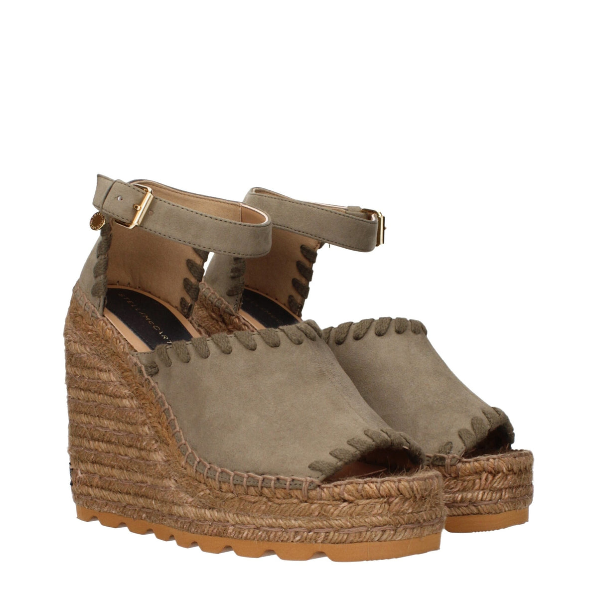 Stella McCartney green leather wedge sandals featuring ankle straps and a chunky heel, stylish and eco-friendly footwear.
