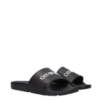 Off-White black cotton slippers with casual slip-on design and brand logo detail on the upper.