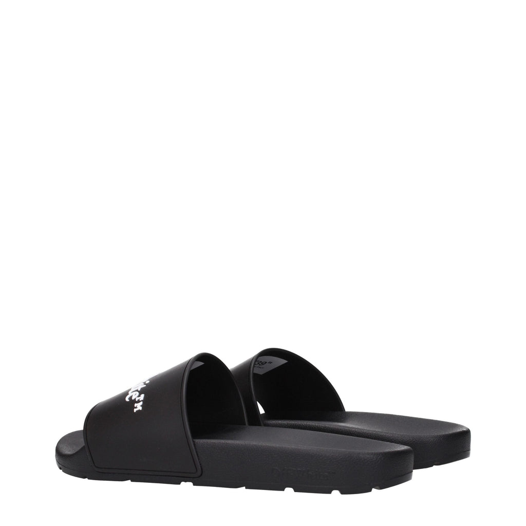 Black cotton slippers by Off-White featuring a sleek design and comfortable slip-on style.