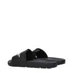 Black cotton slippers by Off-White featuring a sleek design and comfortable slip-on style.