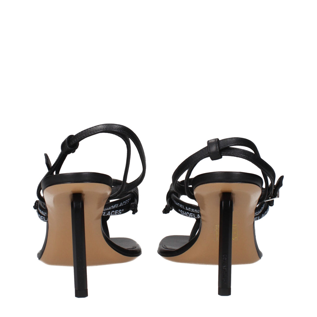 Off-White black leather flip-flop sandals with minimalist design and textured straps, perfect for casual summer wear.