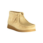 Clarks beige suede men's sneaker with white sole and laces, stylish casual footwear for everyday wear.