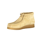 Clarks beige suede men's sneaker with white rubber sole, casual athletic shoe, stylish and comfortable for everyday wear.
