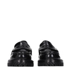 Off-White black leather slip-on loafers with sleek design and minimal branding, ideal for stylish casual or formal wear.