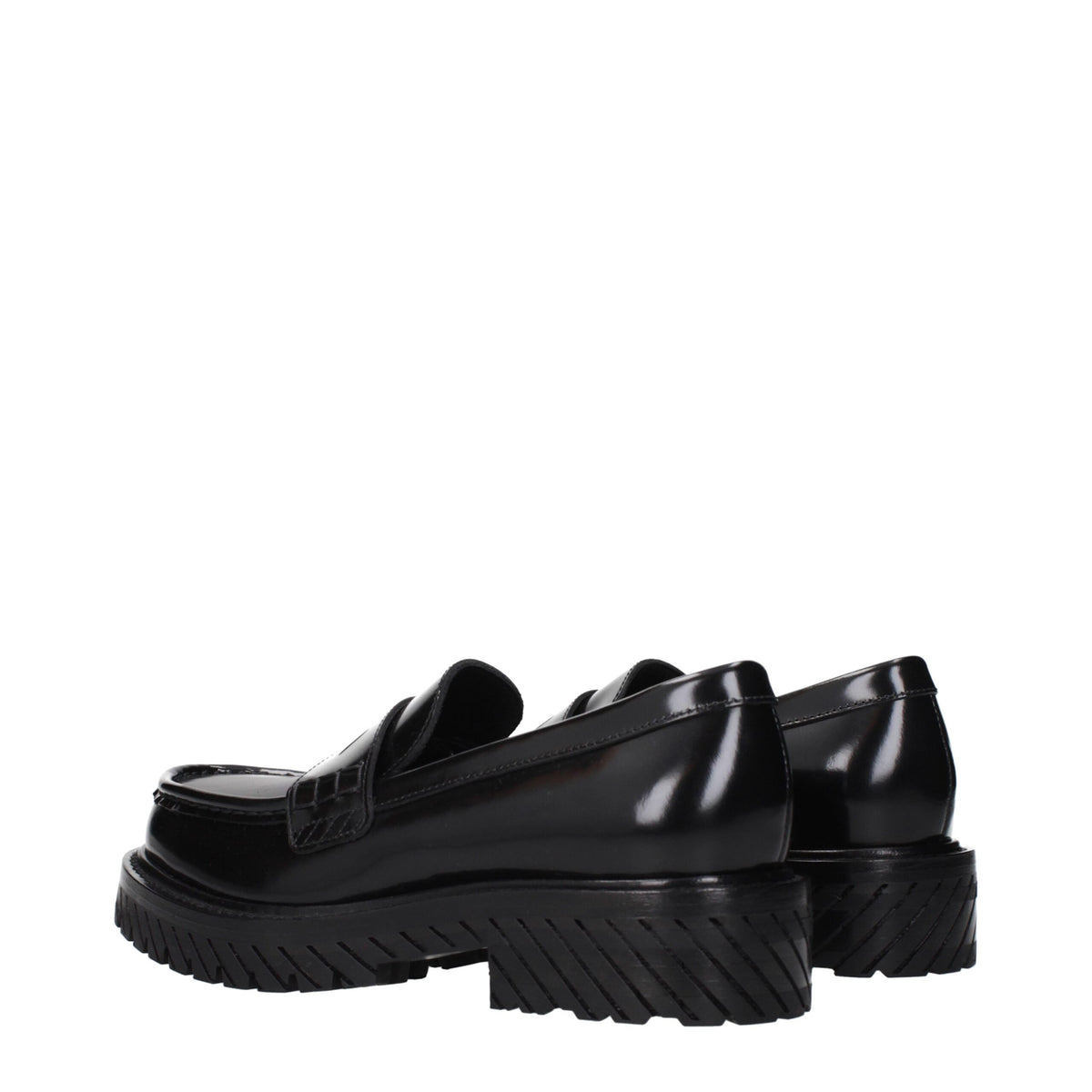 Off-White black leather slip-on loafers with sleek design and minimal detailing, showcasing smooth leather and comfortable fit.