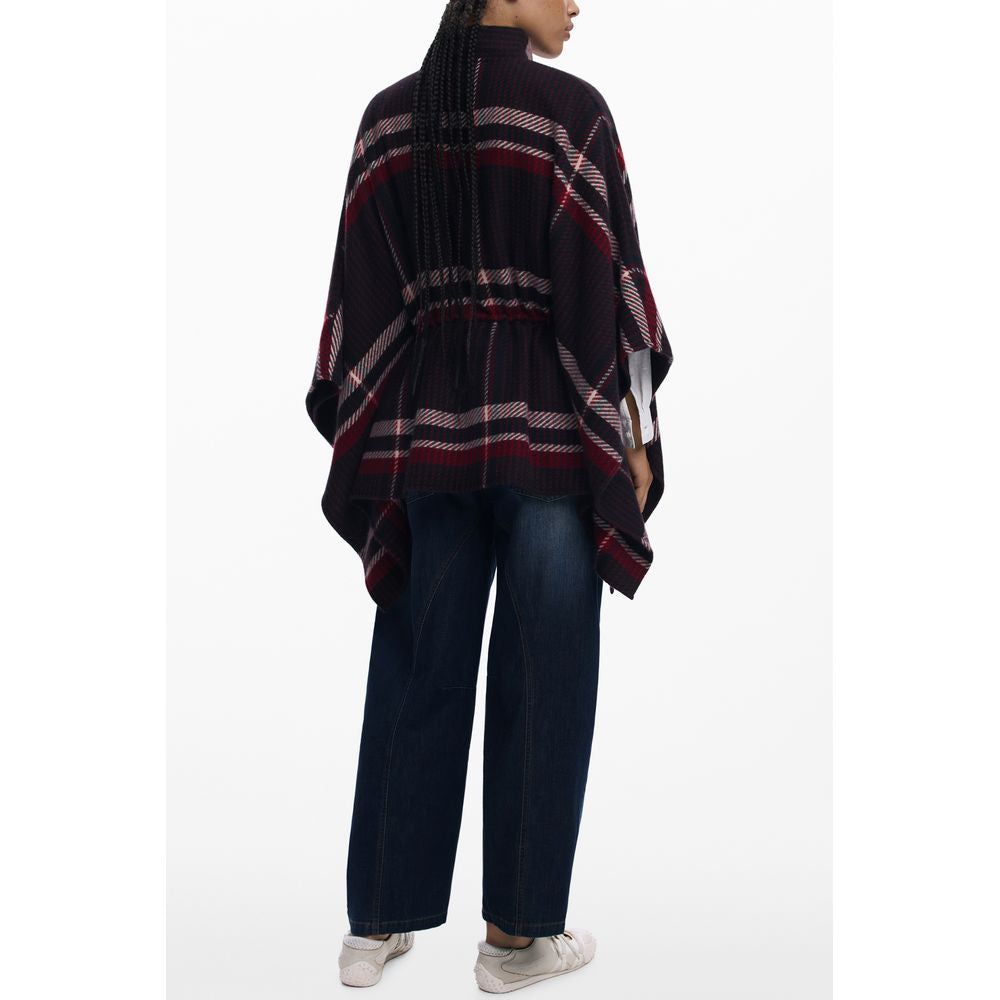 Black polyester women's poncho by Desigual with a relaxed fit and subtle texture, designed for stylish comfort.