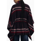 Black polyester women's poncho by Desigual, featuring a stylish, draped design with a loose fit and subtle brand detailing.