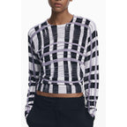 Desigual Bianco Viscosa women's sweater in white with a relaxed fit and subtle textured pattern, displayed on a hanger.