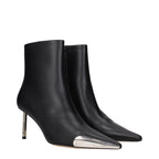 Off-White black leather ankle boots with sleek design and pointed toes, showcasing stylish footwear fashion.
