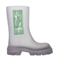 Clear PVC ankle boots from Off-White showing transparent design with chunky soles and ankle-height fit.