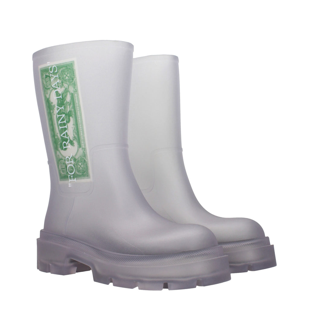 Off-White transparent PVC ankle boots with clear design and sleek silhouette, showcasing modern, high-fashion footwear.