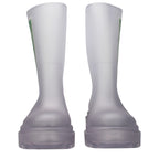 Clear PVC ankle boots from Off-White with transparent design, featuring a sleek and modern silhouette.