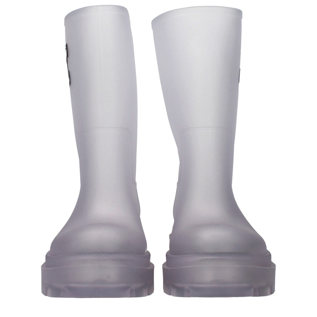 Off-White transparent PVC ankle boots with clear design and black accents, showcasing a modern, stylish footwear option.