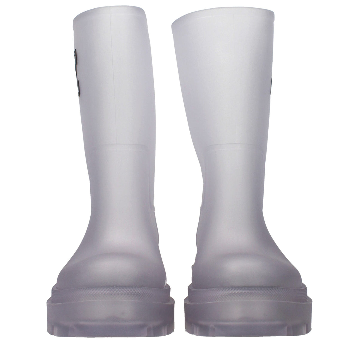 Off-White transparent PVC ankle boots with clear design and black accents, showcasing a modern, stylish footwear option.
