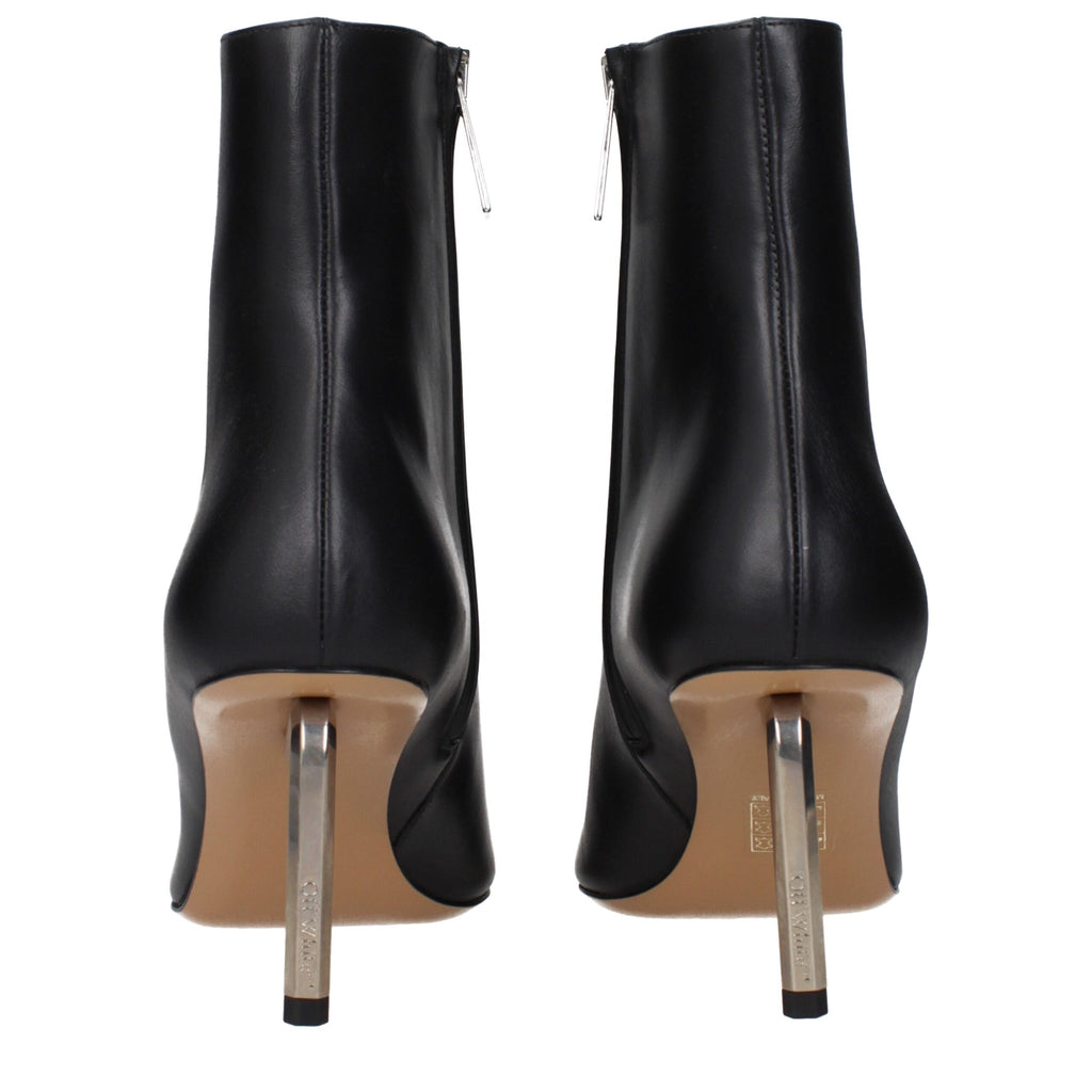 Off-White black leather ankle boots with sleek design and pointed toes, stylish footwear for modern fashion.