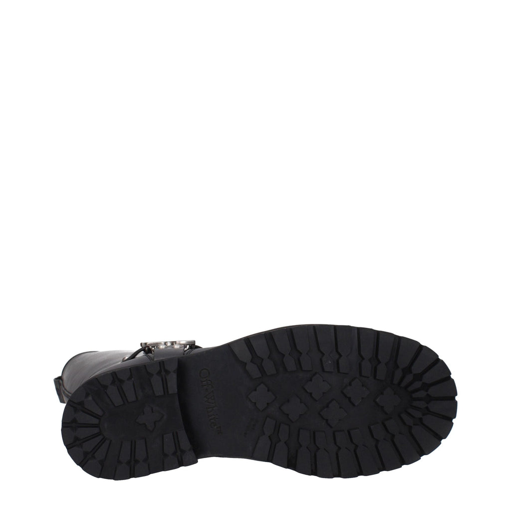 Off-White black leather flat boots with sleek design, rounded toe, and minimal detailing, perfect for casual or stylish footwear.