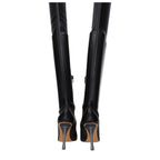 Off-White black leather over-the-knee boots featuring sleek design and pointed toes, displayed on a neutral background.