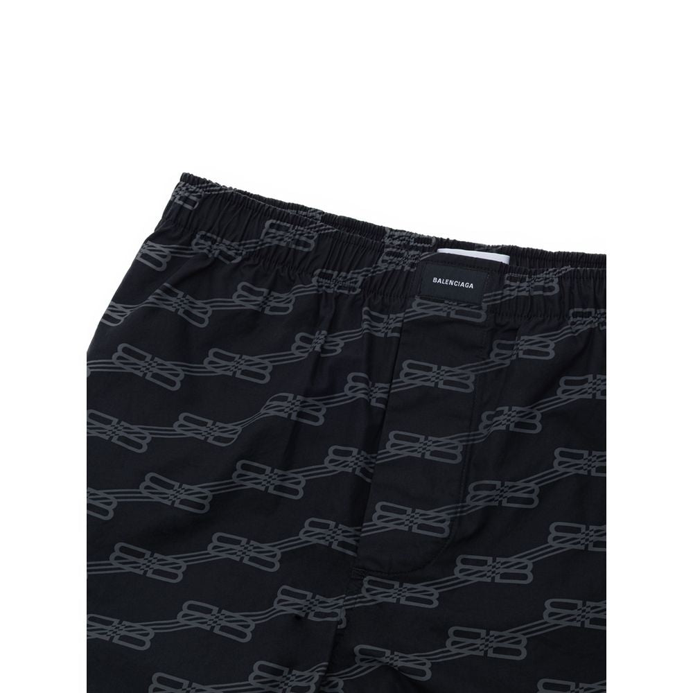 Black cotton Bermuda shorts by Balenciaga featuring a relaxed fit and minimalist design.