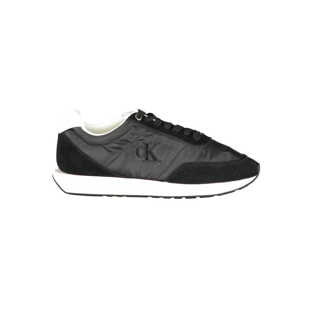 Calvin Klein black polyester women's sneaker with white sole and sleek design, perfect for casual or athletic wear.