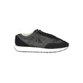 Calvin Klein black polyester women's sneaker with white sole and sleek design, perfect for casual or athletic wear.