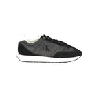 Calvin Klein black polyester women's sneaker with white sole and sleek design, perfect for casual or athletic wear.