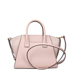Michael Kors pink leather handbag with gold hardware and structured design, featuring top handles and a spacious interior.