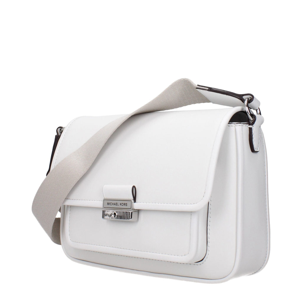 White leather Michael Kors crossbody bag with gold-tone hardware and adjustable strap, showcasing a sleek and stylish design.