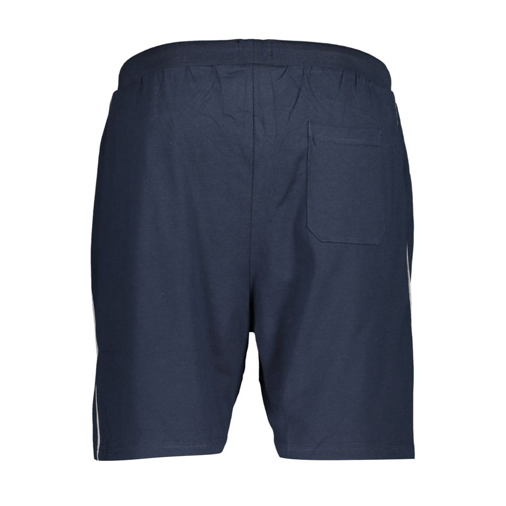 Blue cotton men's track pant by Gianmarco Venturi, showing the relaxed fit and elastic waistband.