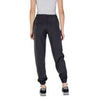Guess Active black polyester joggers with a tapered fit and elastic waistband, designed for comfortable workout and athletic wear.