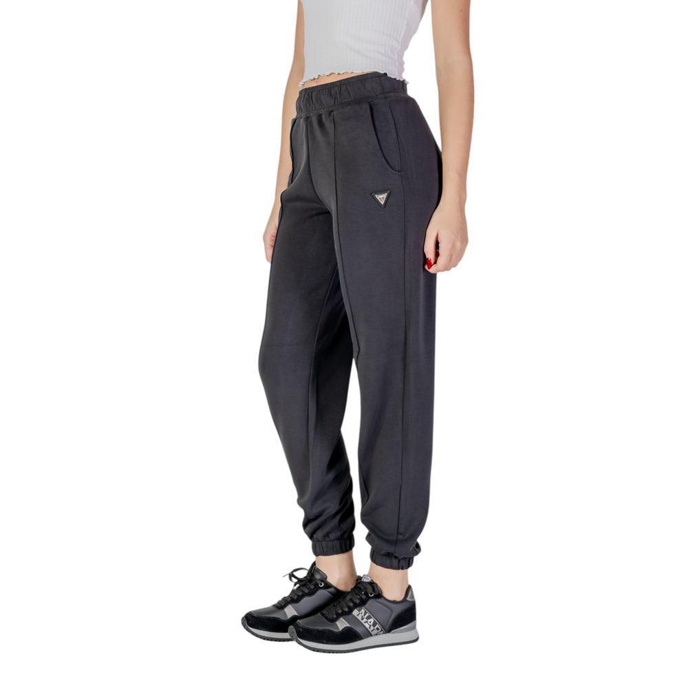 Guess Active black polyester joggers for women, featuring a sleek workout pant design with comfortable fit and subtle branding.