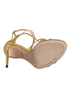 Dolce & Gabbana Gold Leather Keira Heels sandals with open toes and ankle straps, stylish women's footwear.