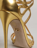 Dolce & Gabbana Gold Leather Keira Heels sandals with open toes and ankle straps, stylish high-heeled shoes for women.