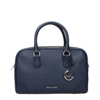 Michael Kors blue leather handbag with gold-tone hardware, featuring top handles and a structured design.