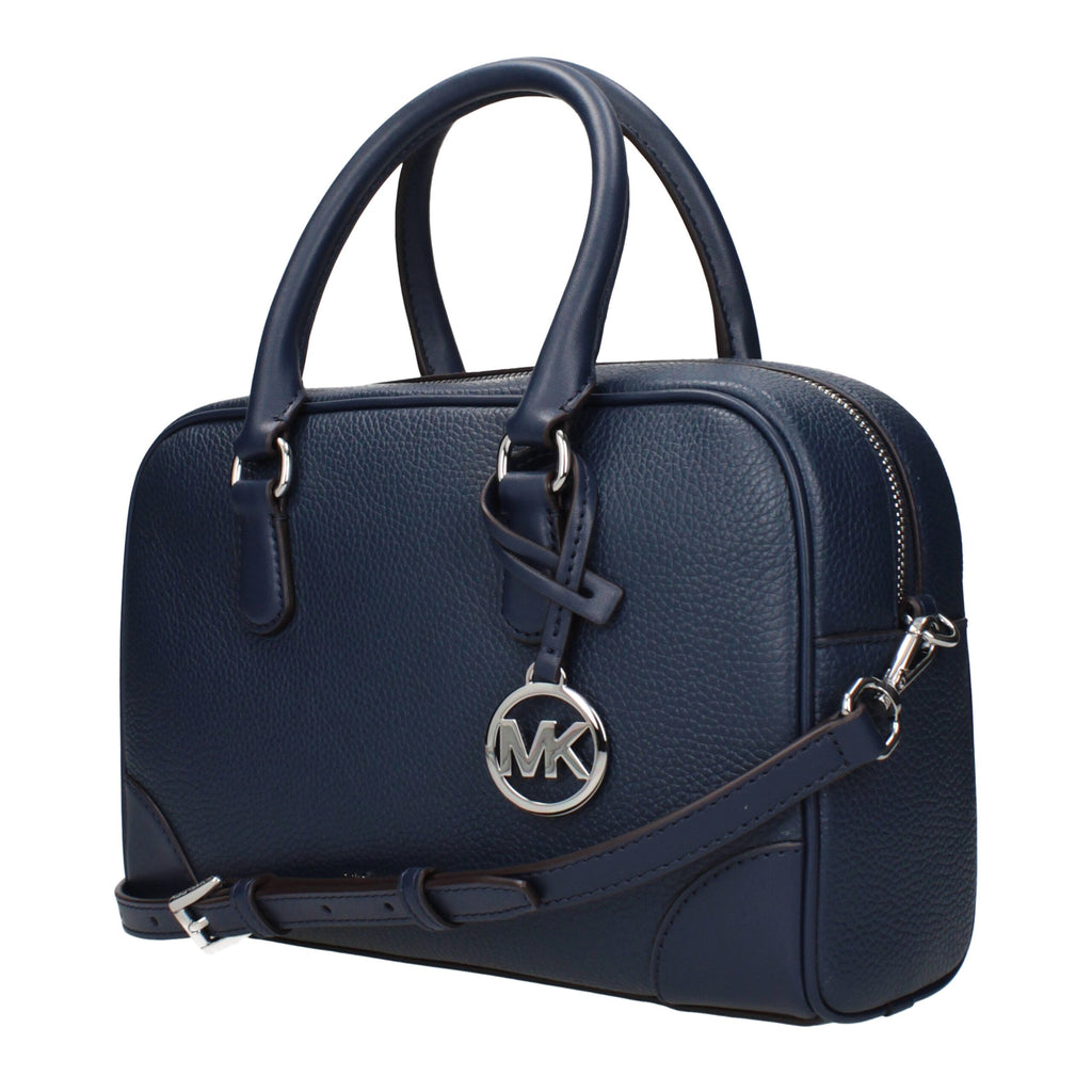 Michael Kors blue leather handbag with silver hardware and structured design, featuring top handles and a sleek finish.