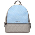 Michael Kors beige fabric backpack with adjustable straps and front pocket, stylish and functional accessory.