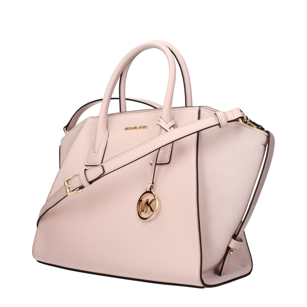 Pink leather Michael Kors handbag with gold-tone hardware and adjustable strap, stylish and spacious for everyday use.