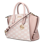 Pink fabric Michael Kors handbag with structured design and subtle logo details, stylishly displayed in the image.