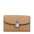 Michael Kors brown leather wallet with multiple card slots and a zip coin compartment, designed for stylish organization.