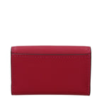 Red leather Michael Kors wallet with multiple card slots and a sleek design, featuring the brand logo and zipper closure.