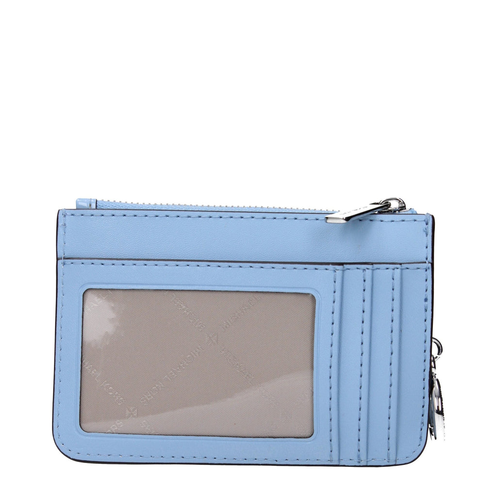 Light blue leather Michael Kors wallet with multiple card slots and a sleek, minimalist design.