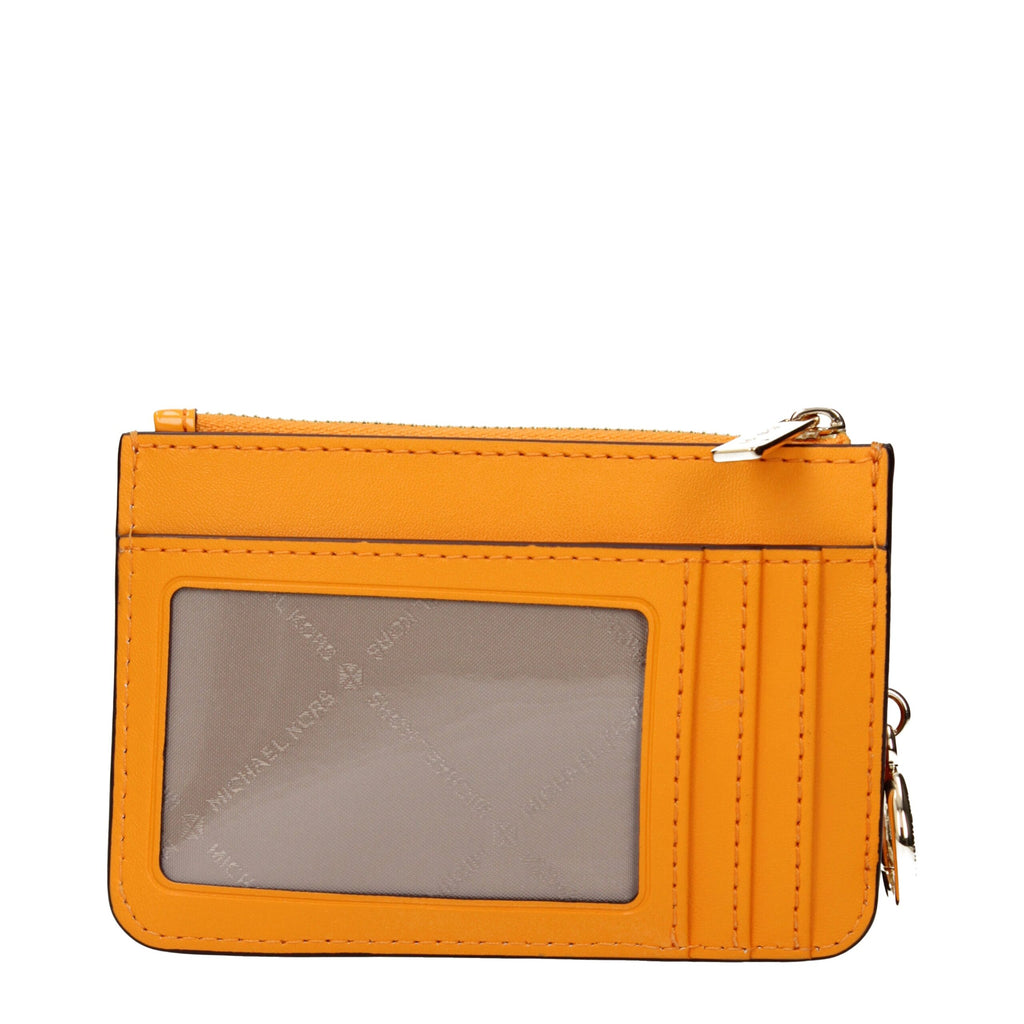 Michael Kors orange leather wallet with multiple card slots and a sleek design, shown on a plain background.