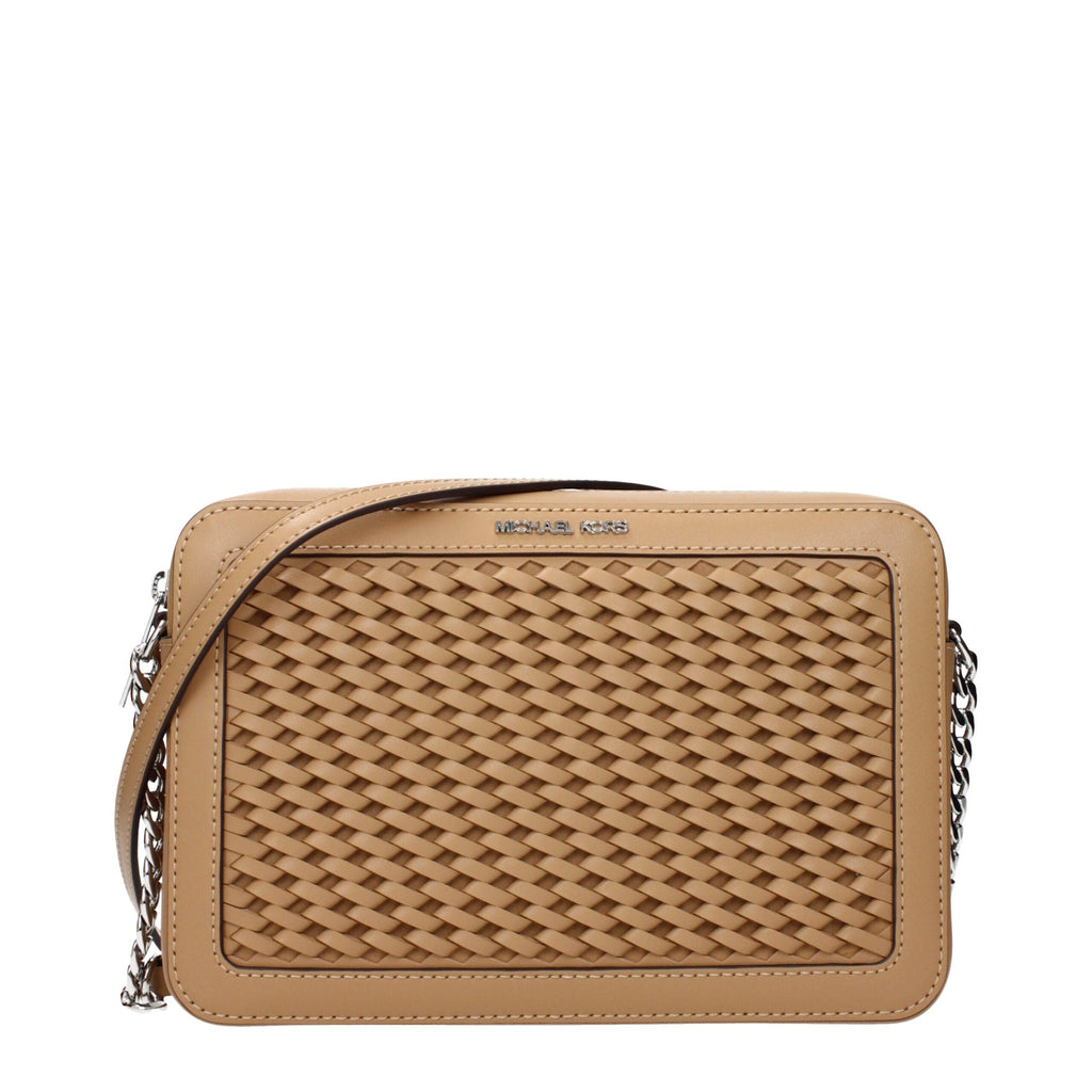 Michael Kors brown leather crossbody bag with adjustable strap and gold-tone hardware, stylish and compact for everyday use.