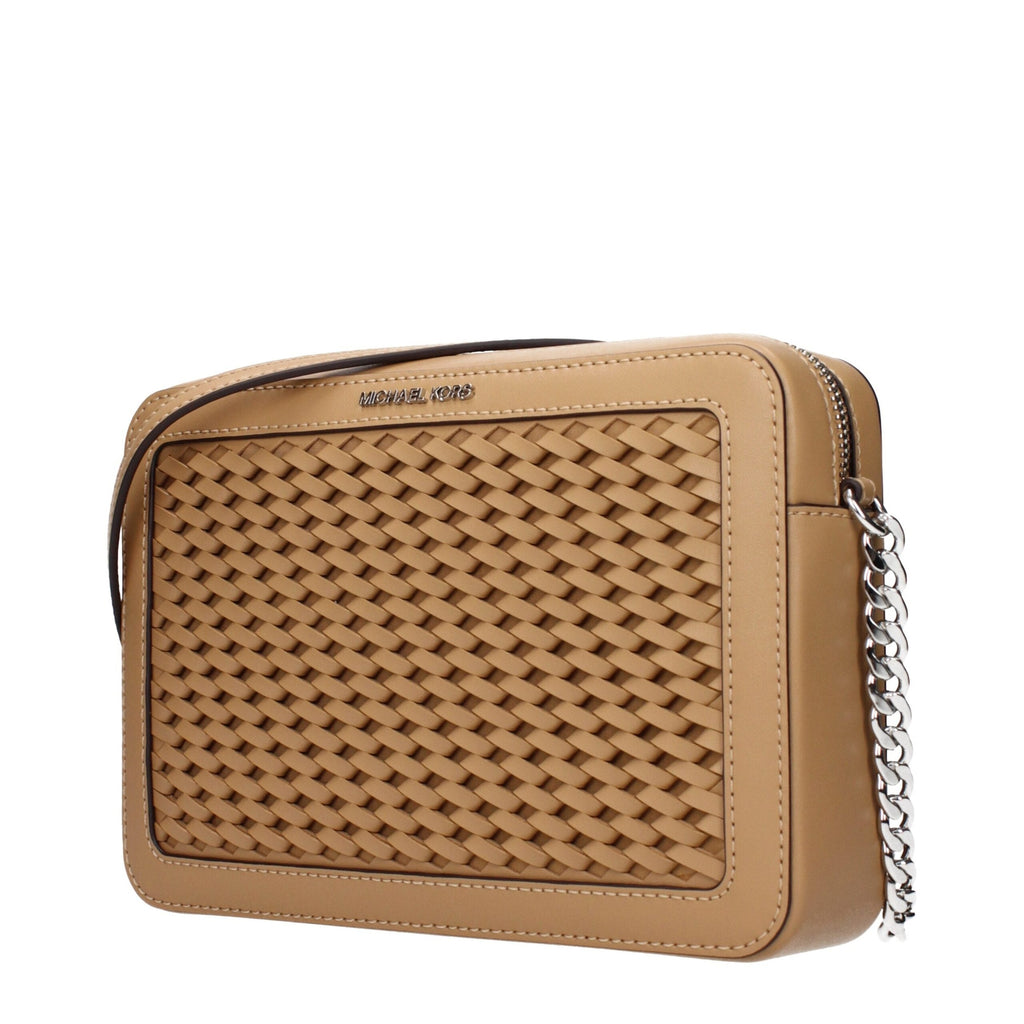 Michael Kors brown leather crossbody bag with adjustable strap and gold-tone hardware, stylish and versatile for everyday use.