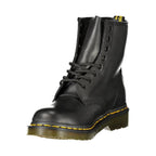 Black leather Dr. Martens unisex ankle boot with chunky sole and classic lace-up design, stylish and durable footwear.