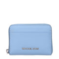 Michael Kors light blue leather cardholder with multiple card slots and sleek design.