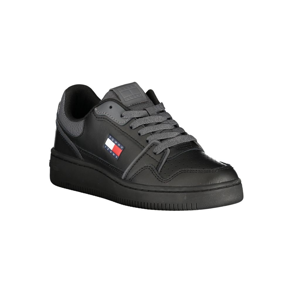 Tommy Hilfiger black polyurethane women's sneaker with white sole and sporty design.