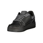 Black Tommy Hilfiger women's sneaker with polyurethane upper and sporty design, featuring white accents and a comfortable sole.