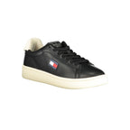 Black Tommy Hilfiger women's sneaker with polyurethane upper and sporty design, featuring white accents and a rubber sole.