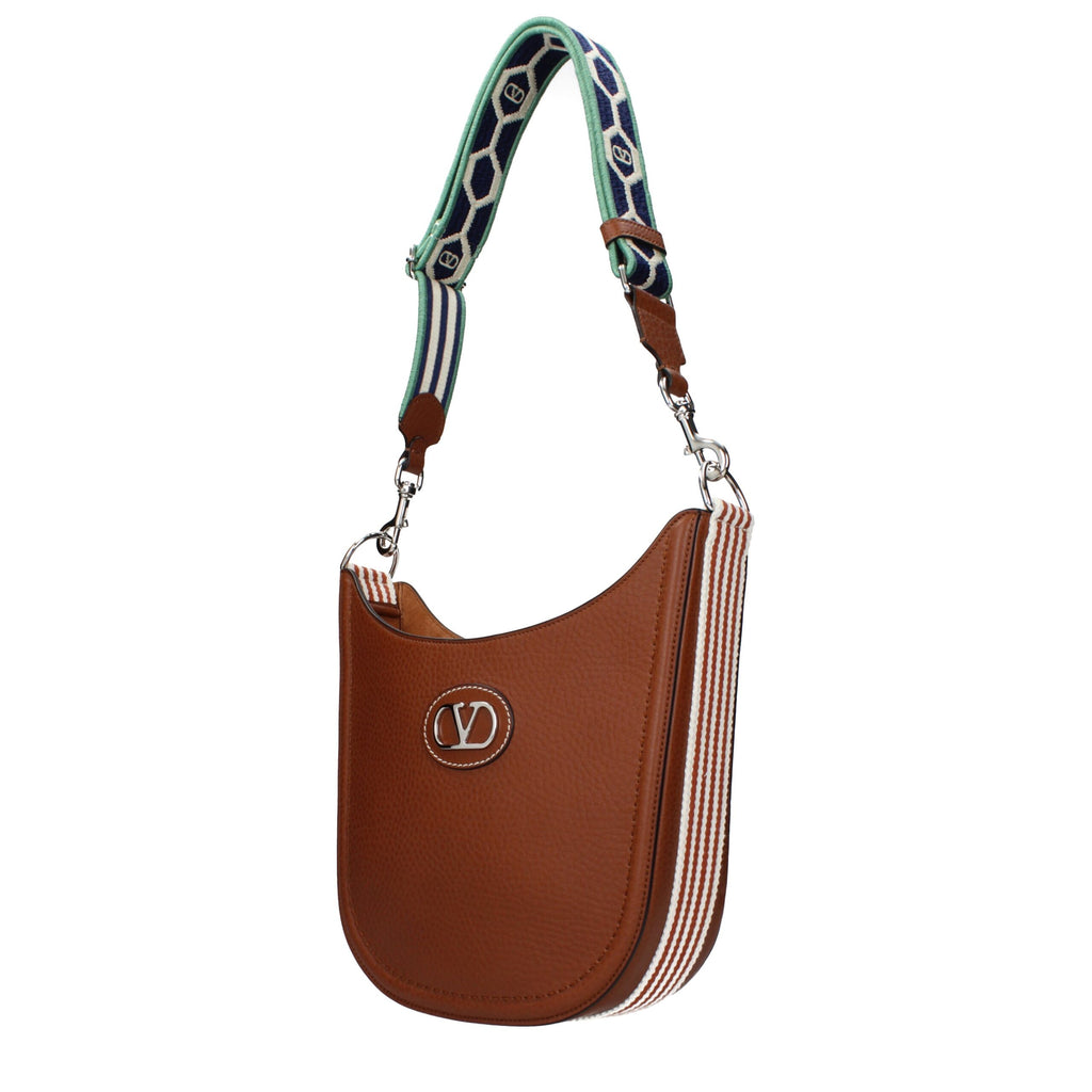 Brown leather Valentino Garavani crossbody bag with adjustable strap and signature logo details.